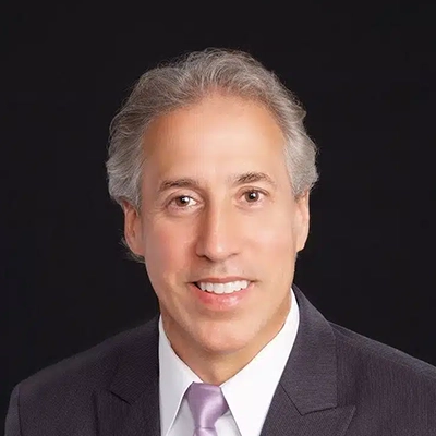 Dentist John R. Striebel Smiling